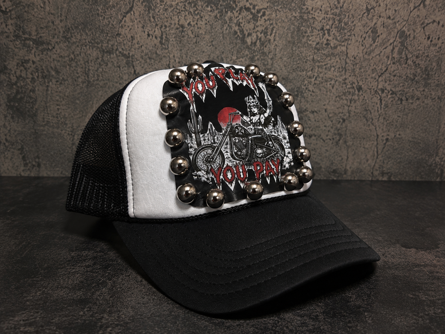 You Play You Pay Studded Trucker Hat