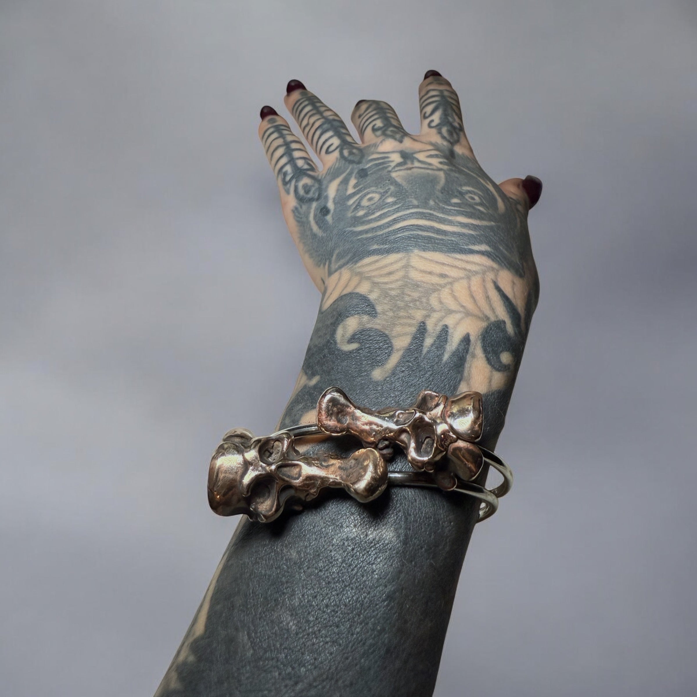 The Eternal Flight Cuffs  (Adjustable Skull Cuffs)
